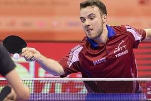 Simon Gauzy playing table tennis