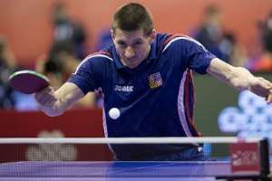 Tomáš Konečný playing table tennis