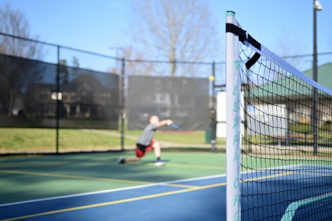 boy-playing-pickleball-2022-11-07-10-05-45-utc